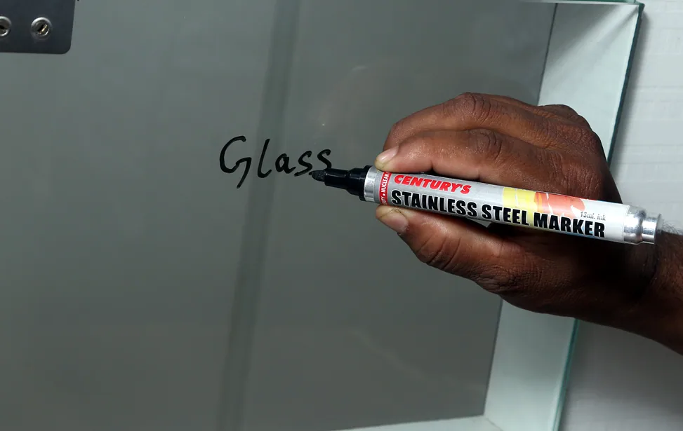 Century's Stainless Steel Marker in use on glass